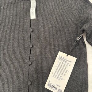 Lululemon Cashmere Charcoal Cardigan with scalloped sleeve